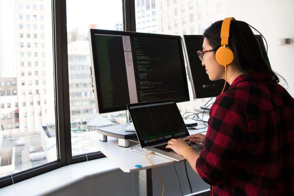 A lady coding away